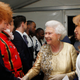 Kylie Minogue introduces Queen Elizabeth II to Ed Sheeran backstage after the 2012 Diamond Jubilee. Photo: Getty.